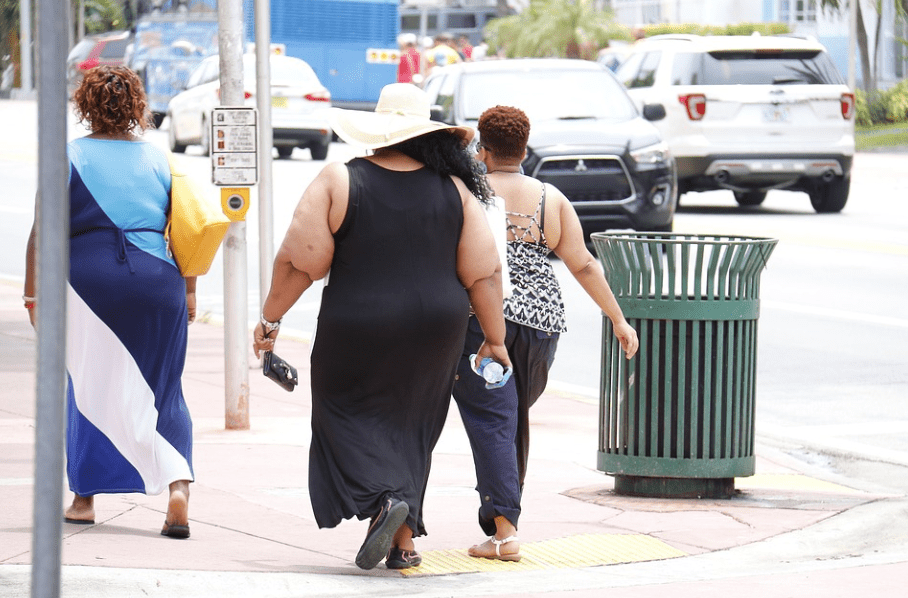 3 big ladies walking